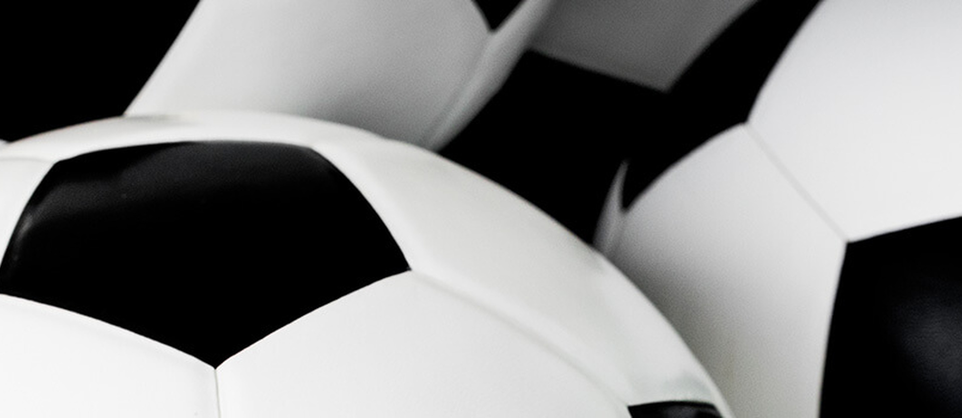 a pile of soccer balls